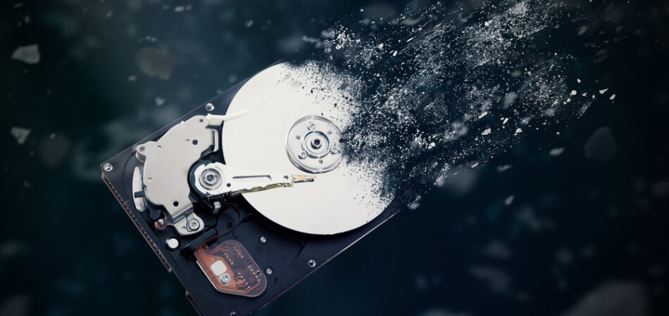 The,old,hard,disk,drive,is,disintegrating,in,space.,conception