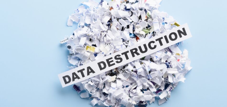 Words,data,destruction,on,top,of,heap,of,cross,shredded