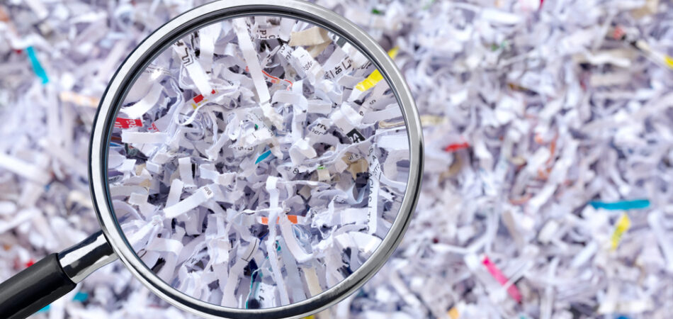 Shreeded,document,under,the,magnifying,glass